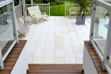 Design ideas for a medium sized contemporary back full sun garden in London with decking.