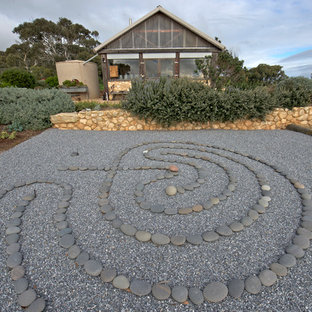 Photo of an asian backyard full sun garden in Adelaide with gravel.
