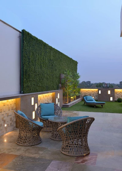 Contemporary Garden by SPACES ARCHITECTS@ka
