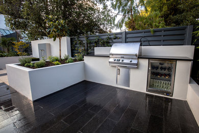 This is an example of a contemporary back garden in London.