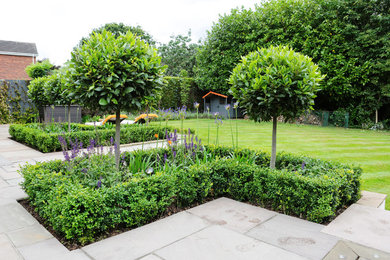 Photo of a contemporary garden in Cheshire.