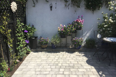 Inspiration for a medium sized traditional courtyard garden in Wiltshire with natural stone paving.