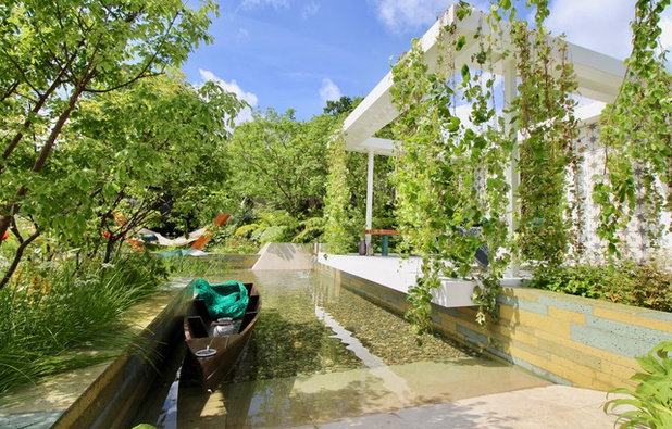 トロピカル 庭 by Kevin Dennis Designs / Cityscape Gardener
