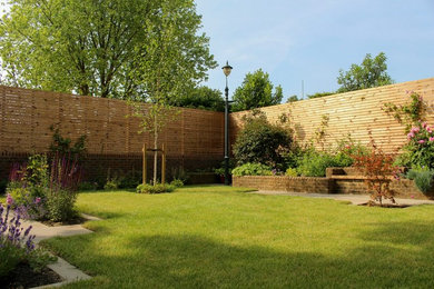 Design ideas for a medium sized contemporary back garden in Sussex.