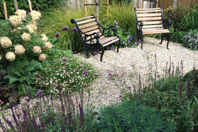 Small classic back partial sun garden in Kent.