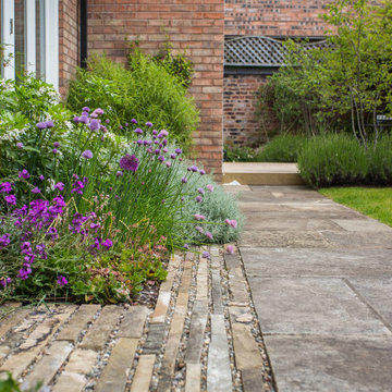 Small Courtyard in the Suburbs by Barnes Walker Landscape Architects