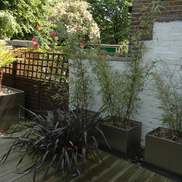 Stainless steel planters on a steel decking