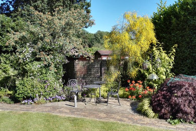 Design ideas for a traditional landscaping in Hertfordshire.