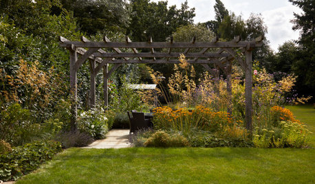 Outdoor Rooms and Soft Plantings Fill an English Country Garden