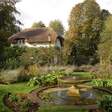 Thatched Roof Cottage and English Gardens