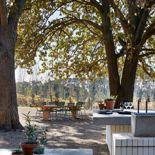 This is an example of a country garden in Melbourne with gravel.