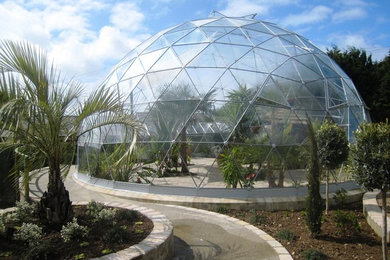 Idee per un giardino tropicale di medie dimensioni