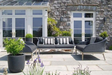 Design ideas for a contemporary patio in Devon.