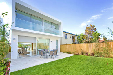 Inspiration for a contemporary back formal full sun garden in Sydney.