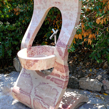 modern fountain in sicilian pink marble