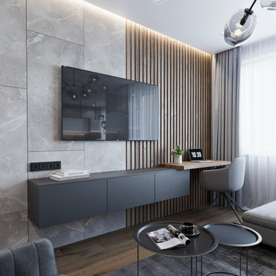 Living room - mid-sized contemporary open concept laminate floor and brown floor living room idea in Other with gray walls and a wall-mounted tv