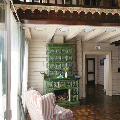 Inspiration for a mid-sized country formal and open concept dark wood floor living room remodel in Other with a standard fireplace, a tile fireplace and white walls