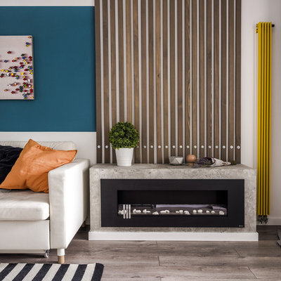 Example of a mid-sized trendy enclosed laminate floor and beige floor living room design in Moscow with white walls and a ribbon fireplace