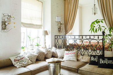 Esempio di un soggiorno minimal con pareti bianche e parquet chiaro