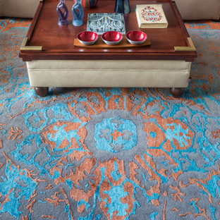 Foto di un soggiorno classico con moquette e pavimento turchese