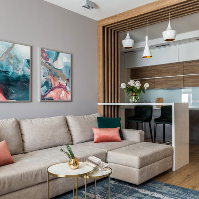 Living room - contemporary open concept medium tone wood floor and brown floor living room idea in Moscow with gray walls