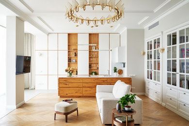 Living room - contemporary open concept medium tone wood floor and brown floor living room idea in Saint Petersburg with gray walls and a wall-mounted tv