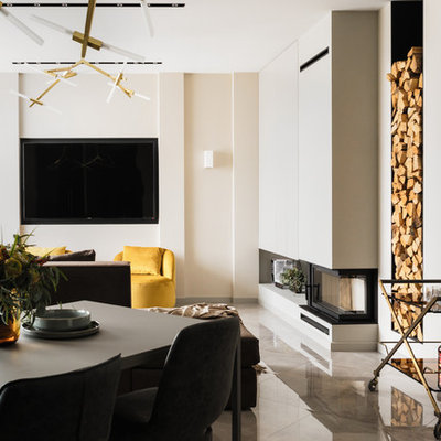 Inspiration for a mid-sized contemporary open concept and formal porcelain tile and gray floor living room remodel in Saint Petersburg with beige walls, a standard fireplace, a plaster fireplace and a wall-mounted tv