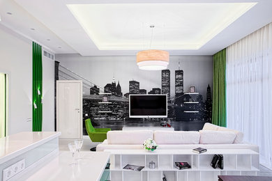 Свежая идея для дизайна: гостиная комната в современном стиле с телевизором на стене - отличное фото интерьера