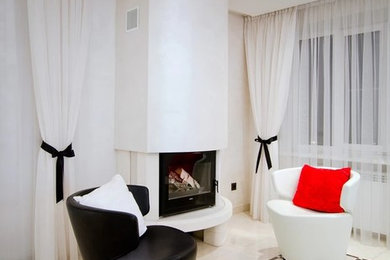 На фото: открытая гостиная комната среднего размера в стиле неоклассика (современная классика) с горизонтальным камином, фасадом камина из камня и белым полом с