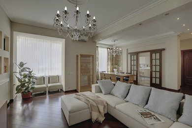 Contemporary living room in Moscow with beige walls and dark hardwood flooring.