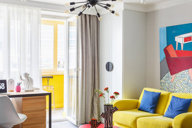 Immagine di un piccolo soggiorno eclettico chiuso con pareti grigie, parquet scuro, pavimento grigio e sala formale