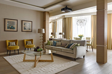 Esempio di un grande soggiorno contemporaneo aperto con sala formale, pareti beige, pavimento in legno massello medio e pavimento beige