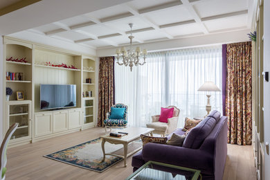 Стильный дизайн: открытая гостиная комната с отдельно стоящим телевизором - последний тренд