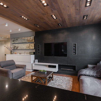Living room - contemporary open concept medium tone wood floor and brown floor living room idea in Moscow with black walls, a ribbon fireplace and a wall-mounted tv