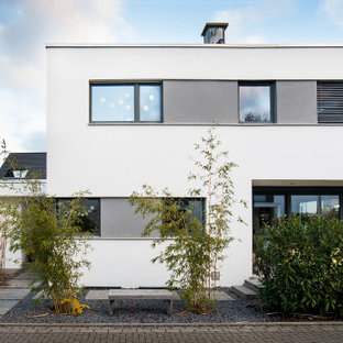 Zweistöckiges, Weißes Modernes Einfamilienhaus mit Flachdach in Sonstige