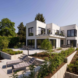 Zweistöckiges, Weißes, Geräumiges Modernes Einfamilienhaus mit Putzfassade und Flachdach in Sonstige