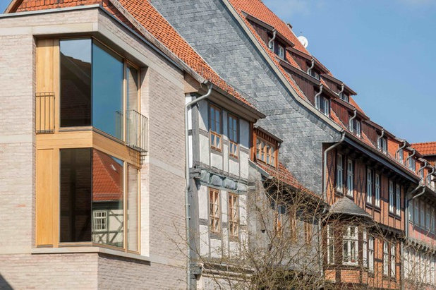 Rustikal Häuser by qBaTuR Planungsgenossenschaft eG