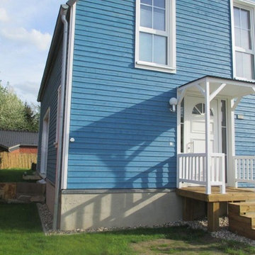 Haus Camen - Einfamilienhaus mit friesenblauer Holzfassade