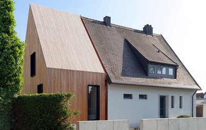 Architektur: Massivholzanbau für ein Augsburger Siedlungshaus