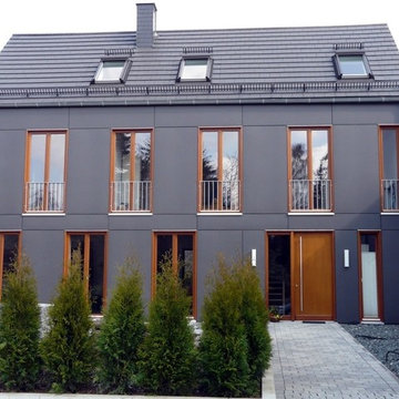 Haus Neuhäuser - Einfamilienhaus mit Plattenfassade