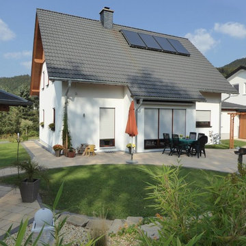 Haus Schönekäs - Klassisches Einfamilienholzhaus mit Putzfassade