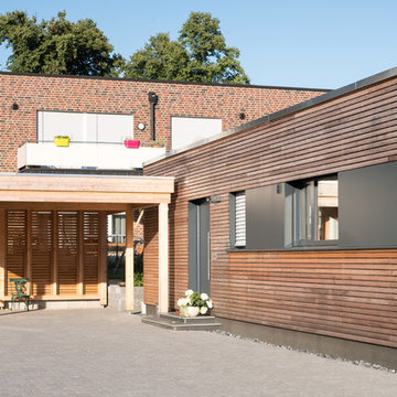 Holzhaus Dülmen: Ein Bungalow der fließenden Übergänge