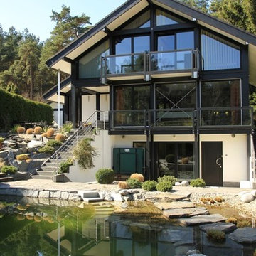 Modernes Fachwerkhaus präsentiert Haus am Hang