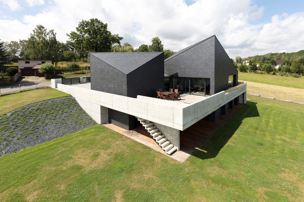 Contemporary Exterior by Rathscheck Schiefer und Dach-Systeme