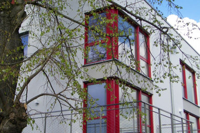Geräumiges Modernes Reihenhaus mit Putzfassade, Flachdach und Misch-Dachdeckung in Dresden