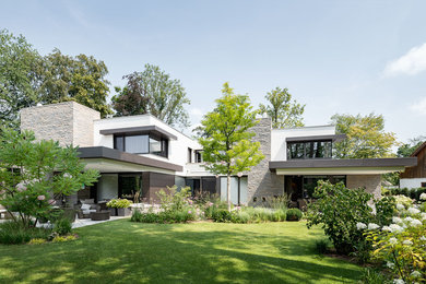 Modernes Einfamilienhaus mit Putzfassade und Flachdach in Sonstige