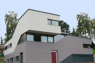 Design ideas for a contemporary house exterior in Dresden.