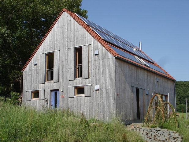 Landhausstil Häuser by Architekturbüro bau.werk Energie