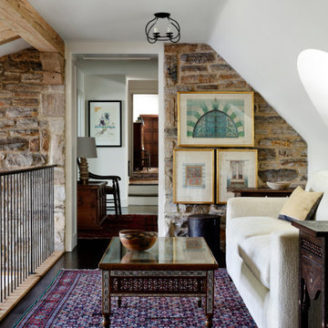 A Stone Gallery Wall Adds Texture To This Hallway