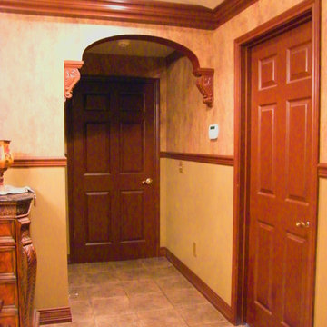 Arched entryway with corbels.